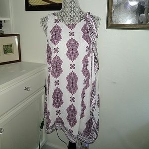 Asymmetrical sleeveless tunic